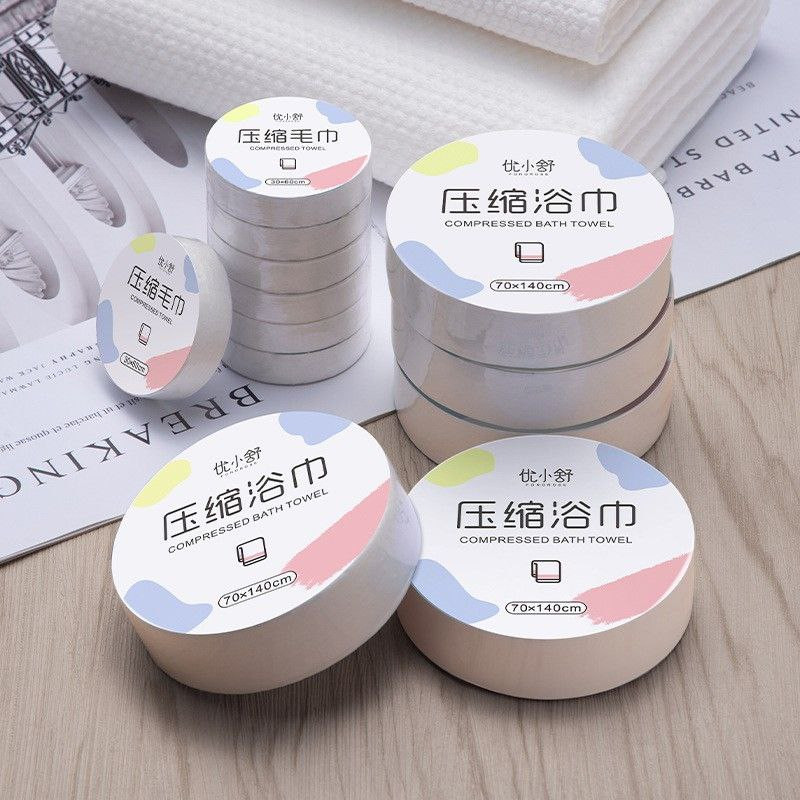 Serviette de bain compressée, serviette épaisse jetable, forte absorption d'eau, portable et confortable pour les voyages d'affaires, les voyages en plein air à l'hôtel, grosses particules